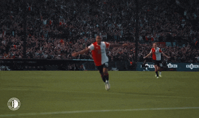 a soccer player wearing a red white and black jersey that says ' auto basics ' on it