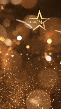 a star fm logo is on a shiny background
