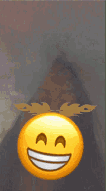 a picture of a person with a smiley face in front of them