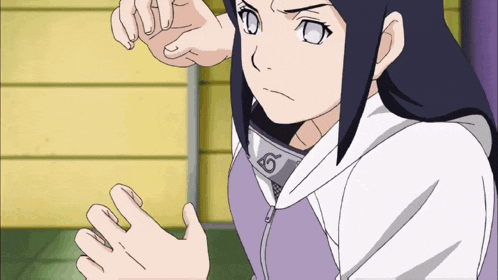 a girl in a purple and white hoodie with the letter g on her neck