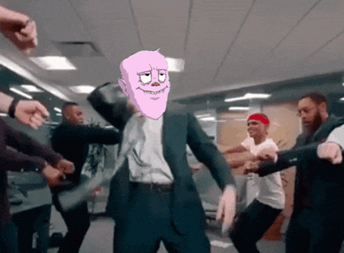 a man in a suit with a pink head is surrounded by a group of people