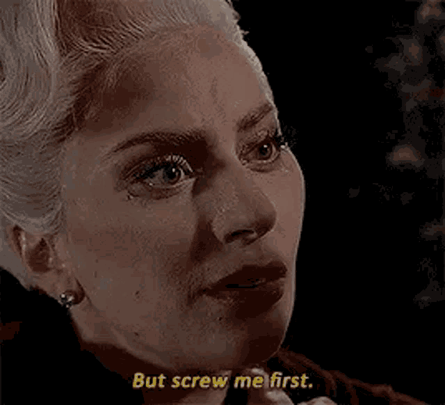 a close up of a woman 's face with the words `` but screw me first '' written in yellow .