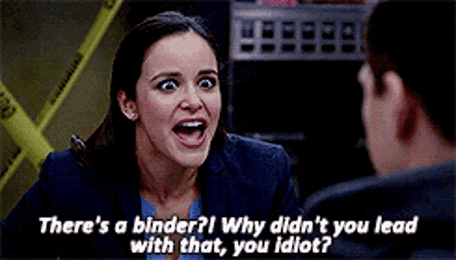 a woman is talking to a man and says there 's a binder why did n't you lead with that
