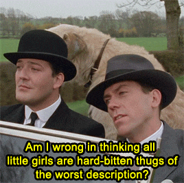 two men in suits and hats with a dog behind them and the caption am i wrong in thinking all little girls are hard bitten
