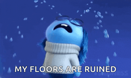 a blue cartoon character is crying and says `` my floors are ruined '' .