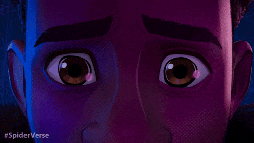 a close up of a person 's eyes with the words #spiderverse written below them