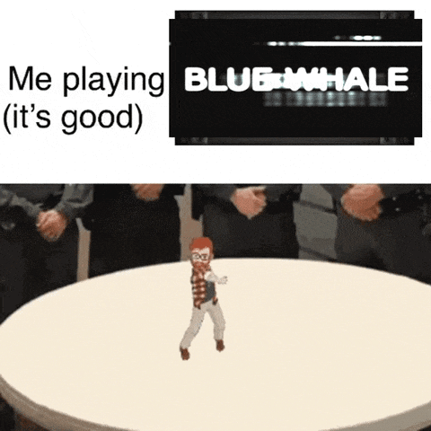 a cartoon character is standing on a round table in front of a screen that says blue whale .