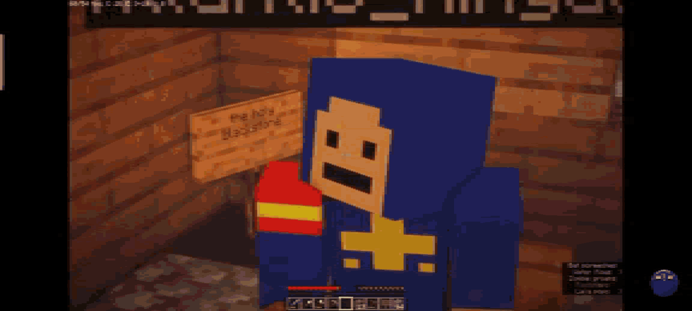 a screenshot of a minecraft game shows a blue shirt with a yellow x on the front