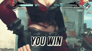 a woman playing a video game with the words " you win " on the screen