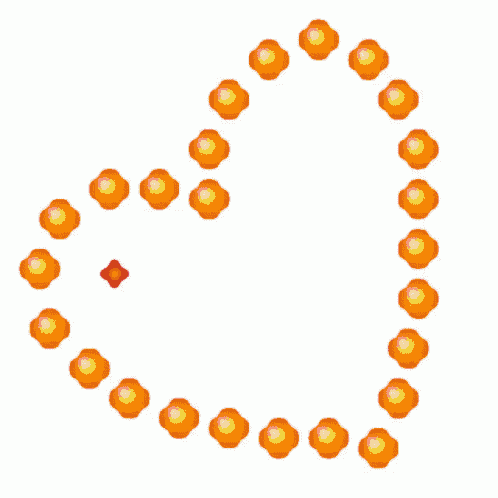 a heart with the word love surrounded by green and orange flowers