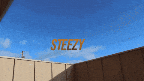 a blue sky with the word steezy written in orange