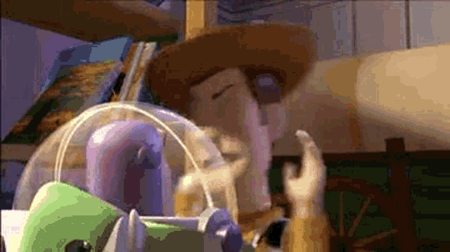 woody and buzz lightyear from toy story are sitting next to each other .