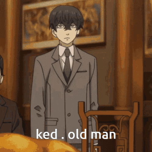 a man in a suit and tie with the words ked old man written below him