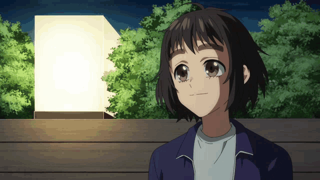 a girl in a blue jacket looks up at something