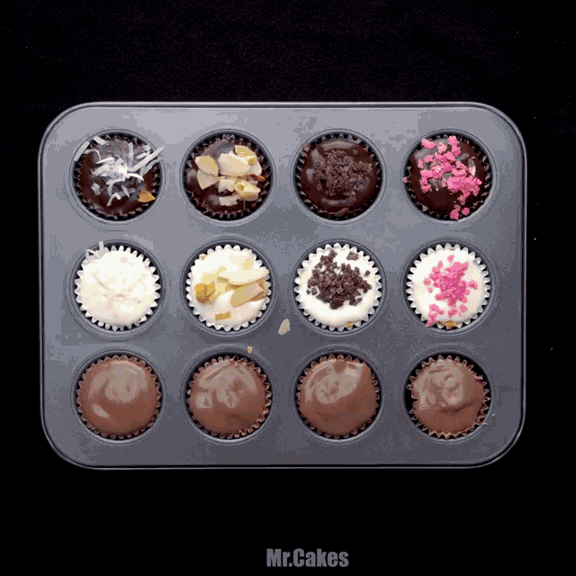 a muffin tin filled with chocolate cupcakes with the words mr.cakes below them