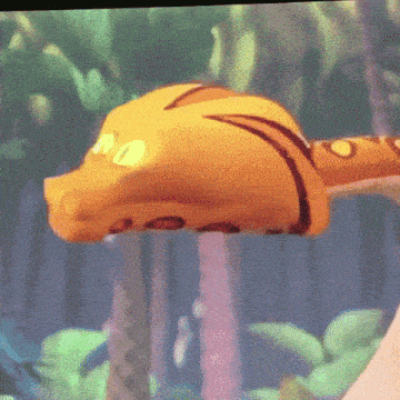 a close up of a cartoon character 's head with a yellow eye