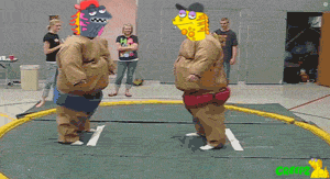 a sumo wrestler wearing a simpson costume stands in front of another wrestler