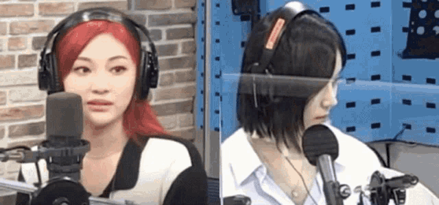 two women wearing headphones are talking into microphones .