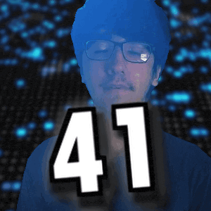 a man with glasses and the number 41 in front of his face