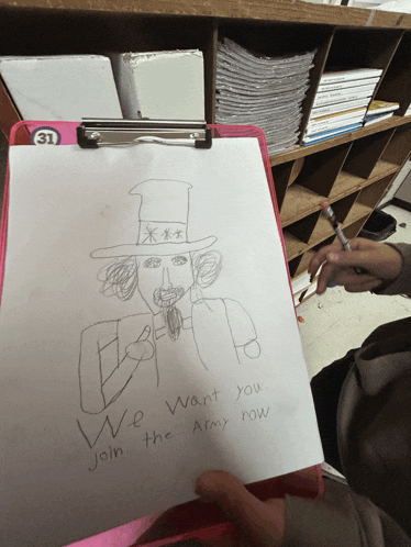 a clipboard with a drawing of uncle sam on it