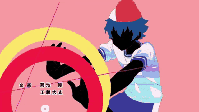 a boy in a white shirt and blue shorts is making a stop sign with his hands