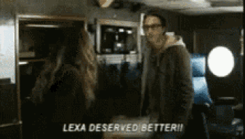 a man and woman standing next to each other with lexa deserved better written on the bottom