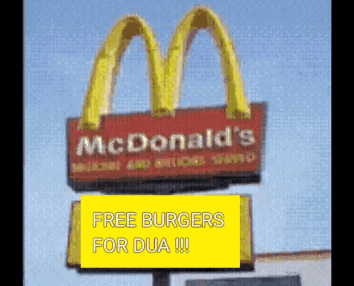 a mcdonald 's sign with a yellow sign below it that says free burgers for dua