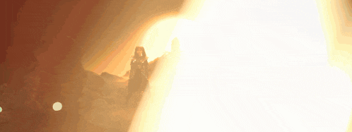 three women are dancing in front of a bright sun