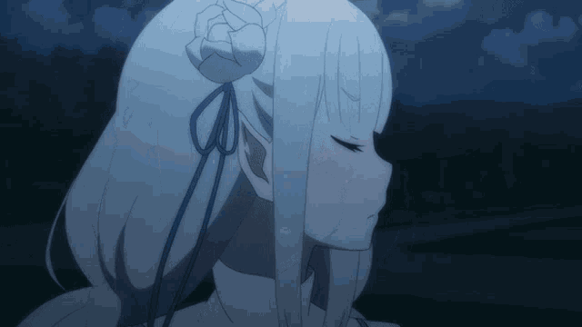 a close up of a girl with white hair