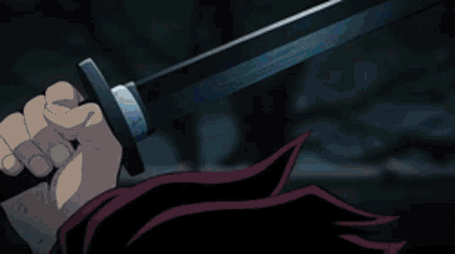 a person is holding a sword with smoke coming out of it in a dark room .