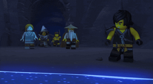 a group of lego characters are standing in a dark room