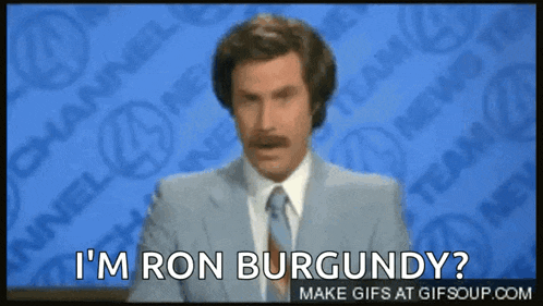 a man in a suit and tie is asking if he is ron burgundy