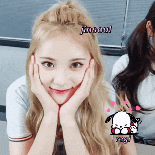 a girl with her hands on her face has the name jinsoul above her head