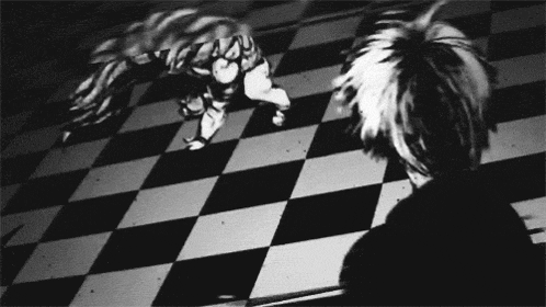 a black and white photo of a checkered background
