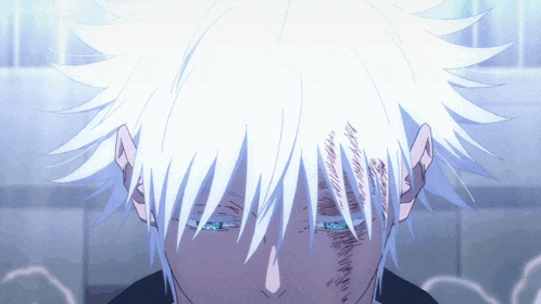a close up of a person 's face with blue eyes