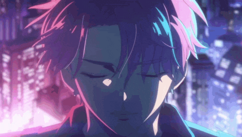 a close up of a person 's face with purple and blue hair