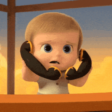 a baby from the boss baby is talking on a telephone .