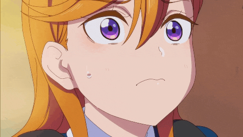 a close up of a girl with purple eyes and orange hair