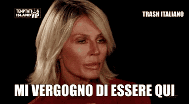 a woman says " mi vergogno di essere qui " in front of a sign that says temptation island vip