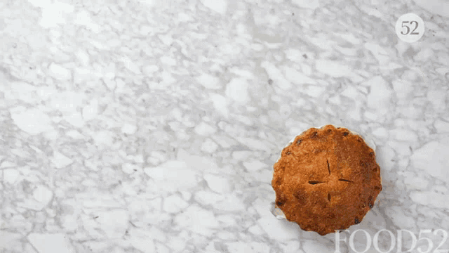 a marble counter top with food52 written on the bottom