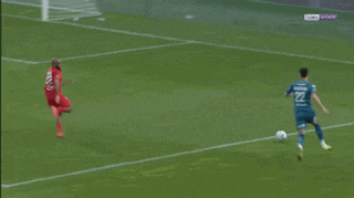 a soccer player with the number 12 on their jersey