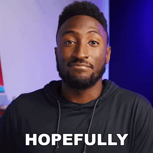 a man with a beard is wearing a black shirt with hopefully written on it