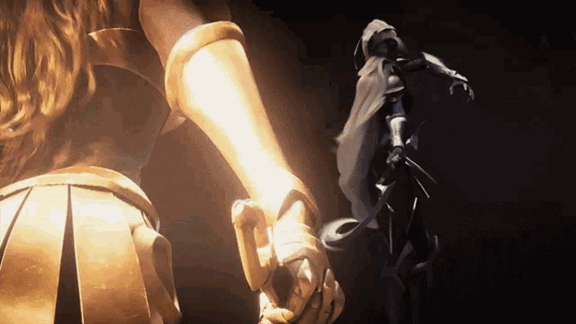 a woman in a gold armor holds the hand of another woman in a black armor