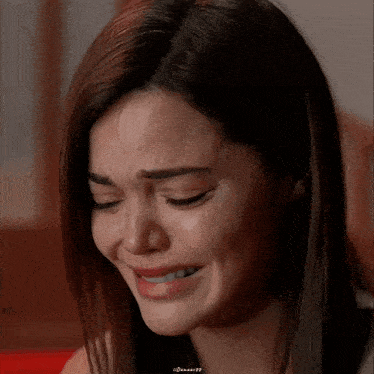 a close up of a woman 's face with a watermark that says ' duncan23 '