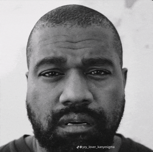 a black and white photo of a man with a beard and the caption kanyesigma