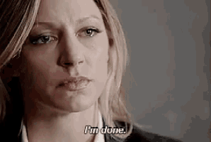 a woman is saying i 'm done in a close up of her face