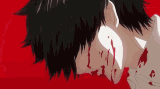 a close up of a person 's face with blood on it on a red background .