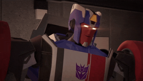 a close up of a transformer with a purple and white stripe on his chest