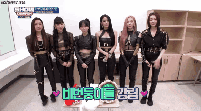a group of women standing next to each other with show champion written on the top