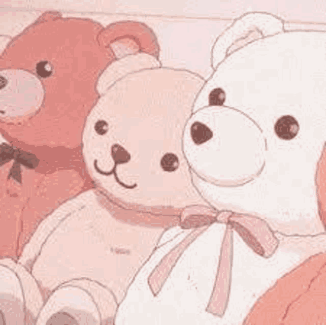 three teddy bears are sitting next to each other on a bed in a room .